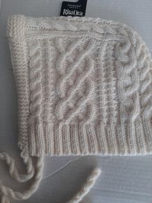 New hat Rita Orr tag attached