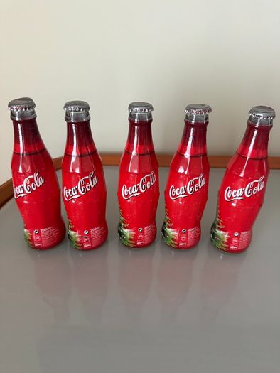 5 Vintage Christmas Coca Cola bottles