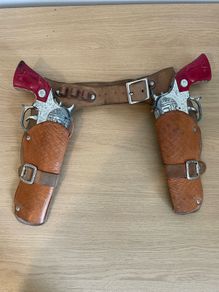 Vintage Lonestar cap guns with caps, leather  holsters with belt with cowboy hat c1960/70s