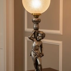 antique cherub lamp