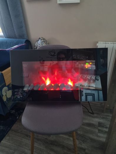 Electric fire. Aspen wall mounted electric fire Now Reduced to thirty euro