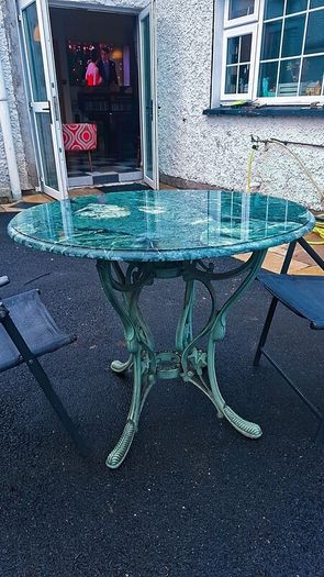 marble top cast iron table