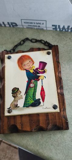 CONSTANCE - EDITIONS ceramic photo  fitted on wooden plaque vintage 1960s or 1970s -Big Eyes- style  wall featuring a whimsical hobo child illustration signed by the artist. produced in Italy during the retro decor .