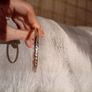 Silver tone bracelet with blue stones and words on it Image 2