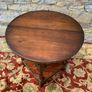 Early 20th Century solid oak gate leg drop leaf table. Image 2