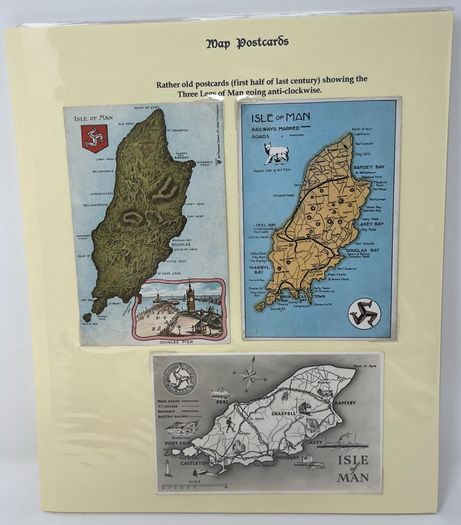 24 Beautifully written up Isle of Man display pages with lots of postcards and stamps. Maps, IOM TT and Manx cat noted