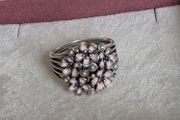 Pandora cherry blossom bouquet ring, size 58 some signs of wear on the back, as shown in the photos. Otherwise, no issues.
