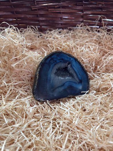 Polished blue agate geode slice.
