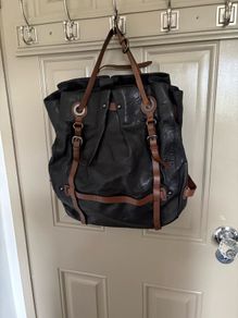 Genuine leather black and dark brown shoulder bag by Karen Millen