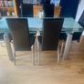 Glass & Chrome Dining Room Table with 6 Black leather and Chrome Chairs Image 2