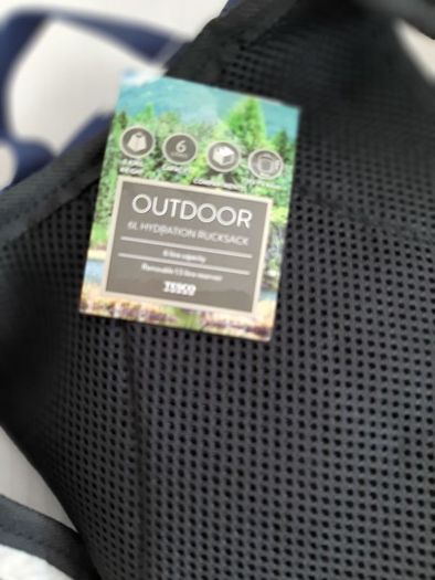 new navy hydrational bag pack tag attached