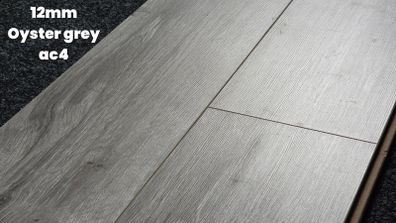 Oyster grey Laminated flooring - 12mm thick -  narrow plank