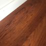 Beautiful Laminate Wood Flooring in dark wood taken up from a room measuring approximately 11 x 7 ft. Image 2