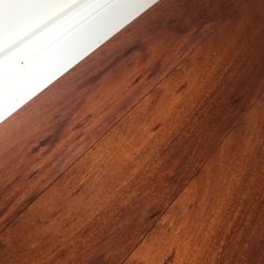 Beautiful Laminate Wood Flooring in dark wood taken up from a room measuring approximately 11 x 7 ft.