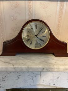Clock and mahogany cabinets