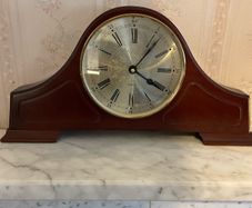 Clock and mahogany cabinets