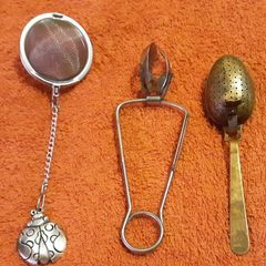 vintage and modern tea strainers