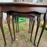 A vintage glass-protected, gold-tooled, leather top nest of tables Image 2