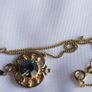 Gold Plated Necklace with Purple Stone. Stone is Multifaceted & Sparkles in the Light. Image 6