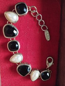 A beautiful gold-tone bracelet.