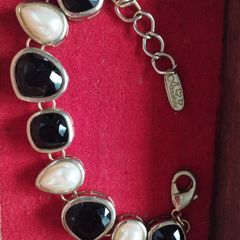 A beautiful gold-tone bracelet.