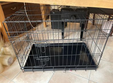 a small dog cat cage