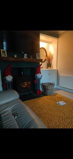 18kw stove, hearth and custom made mantlepiece