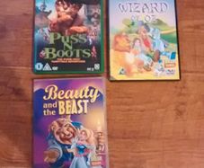DVD's - The wizard of oz / Puss in boots / Beauty & the beast