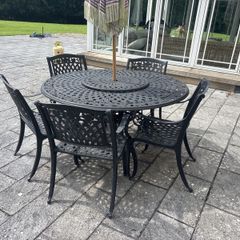 cast iron heavy garden table and 4 chairs