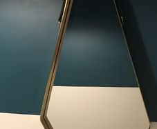 Brass and leather wall mirror