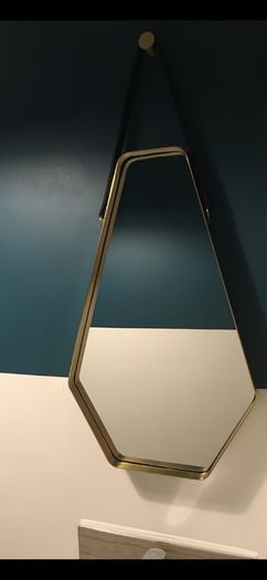 Brass and leather wall mirror