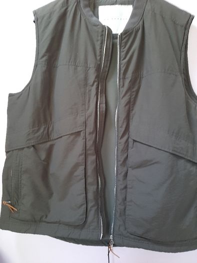 New Sleeveless jacket with tag