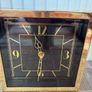 Gold clock with black face Image 2