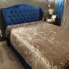Navy blue double bed frame with underneath storage