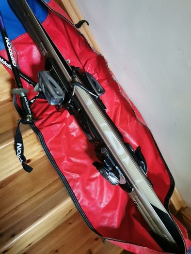 Atomic skis, gipron poles and storage bag
