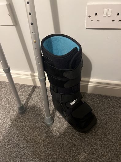 Pair of crutches and orthopedic boot