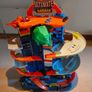 Hot Wheels T-Rex Garage + Transporter + Cars Image 2