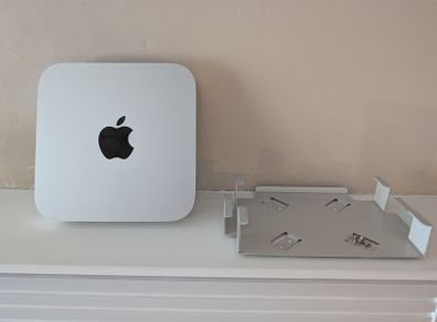 Apple Mac mini with mounting bracket