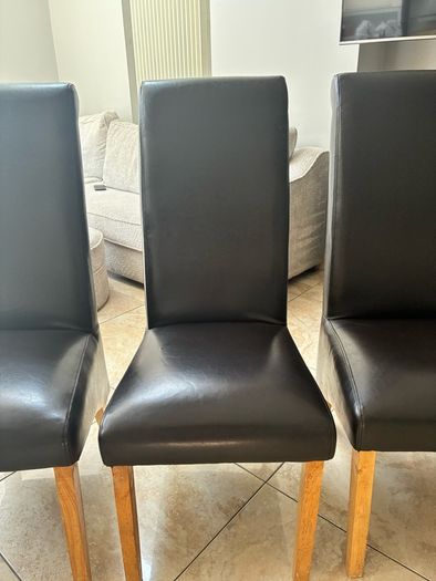 4 brown leather chairs