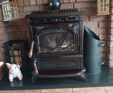 Stanley  stove with a back boiler