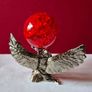 Crackle glass ball and metal angle base. Image 3
