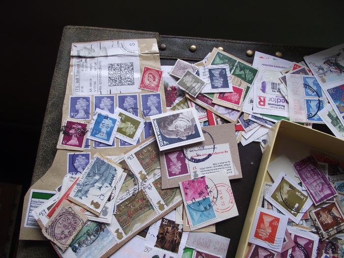 A box with collection of stamps from Great Britain