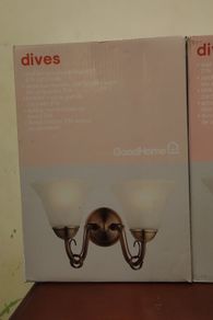 Two "Dives" wall lights Brand new in box