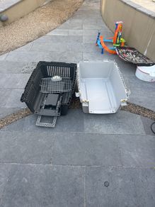 Medium size dog carry crate.