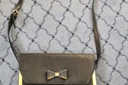 Black and Gold Bow Shoulder Bag from Atmosphere