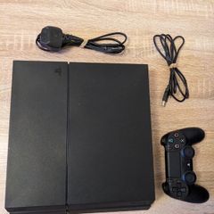 PS4 console with official controller