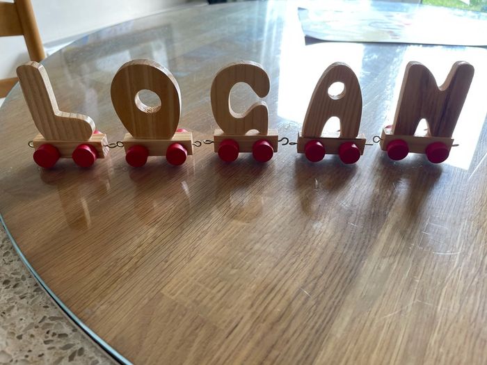 Assortment of wooden letters on wheels