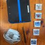 Nintendo 2DS with games and charger Image 2