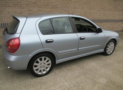 almera -n16 '06  Right Rear silver door in perfect condition!