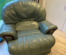 Leather recliner/swivel armchair